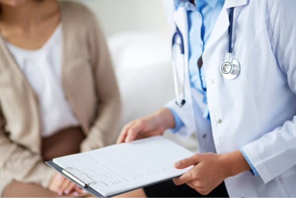 doctor holding clipboard